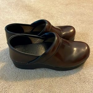 Dansko Patent Brown Clogs
